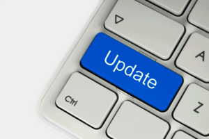 Schaltfläche "Update" auf der weißen Tastatur